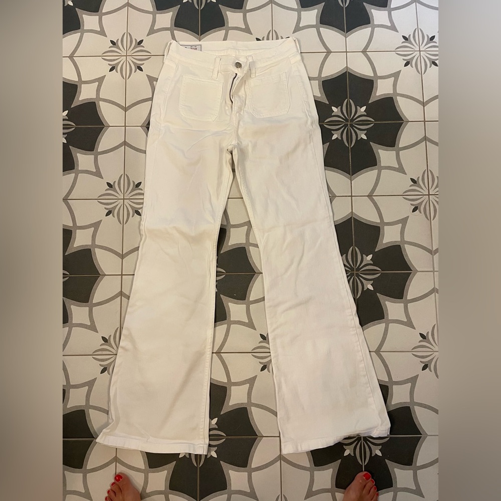 White 70s flare high rise white jeans